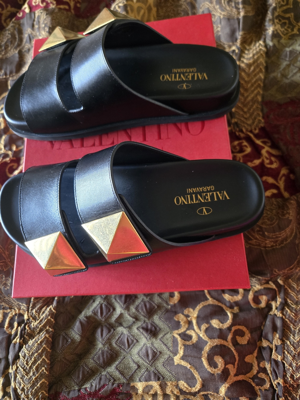 Valentino Garavani Black Slide Sandals with Gold Pyramid Studs